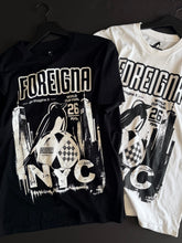 Load image into Gallery viewer, Two t-shirts, one white and one black, with graphic designs and text on a dark surface.